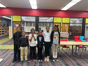  boys and 3 girls standing